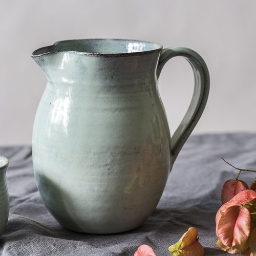 Big ceramic light blue shops pitcher