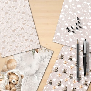 Puede incluir: Una colecci&oacute;n de art&iacute;culos de papeler&iacute;a, incluyendo papeles estampados con dise&ntilde;os de corazones y ositos de peluche, chinchetas, un l&aacute;piz y un bol&iacute;grafo. Los papeles presentan colores beige y blanco suaves, creando una est&eacute;tica suave y acogedora.