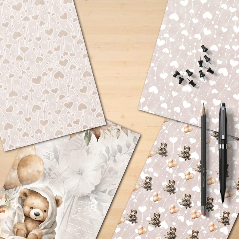 Puede incluir: Una colecci&oacute;n de art&iacute;culos de papeler&iacute;a, incluyendo papeles estampados con dise&ntilde;os de corazones y ositos de peluche, chinchetas, un l&aacute;piz y un bol&iacute;grafo. Los papeles presentan colores beige y blanco suaves, creando una est&eacute;tica suave y acogedora.