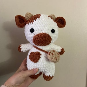 Cookie cow plushie with removable strap