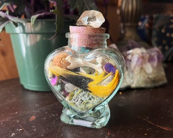 Glass Heart Bottle / Altar Tools / Oddities and Curiosities Home Decor / Feather, Bone, Moss, and Trinket Bottle