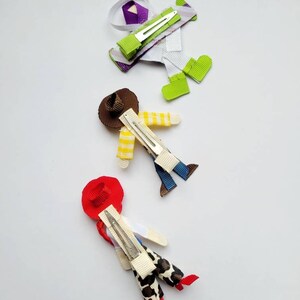 Toy story style Buzz lightyear, woody, Jessie character hair clip set. image 3