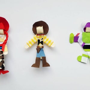 Toy story style Buzz lightyear, woody, Jessie character hair clip set. image 1