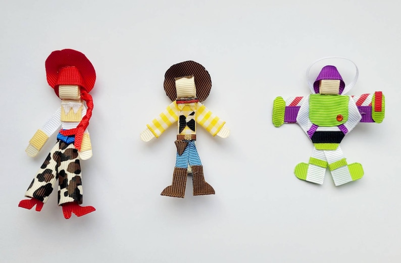 Toy story style Buzz lightyear, woody, Jessie character hair clip set. image 1