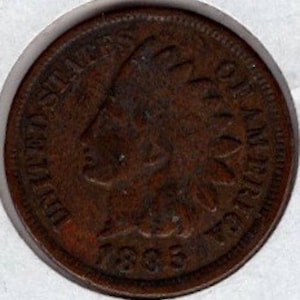 May include: A copper-colored 1863 Indian Head penny coin with the words "One Cent" and "United States of America" around the edge.