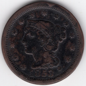 May include: A copper coin with a portrait of Liberty on the obverse. The coin has a date of 1853 and a ring of stars around the edge.
