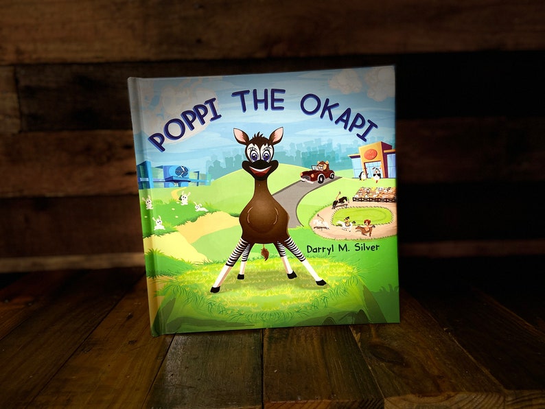 Poppi The Okapi Hardcover Children's Book, Okapi Sticker and Free Digital Download Coloring Book image 1