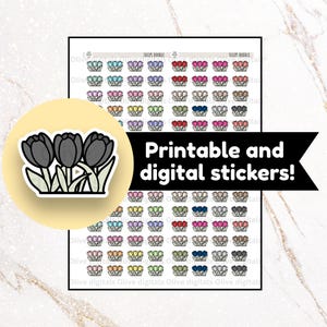 Op de afbeelding: Een vel met printbare en digitale stickers met tulpontwerpen in verschillende kleuren. De stickers zijn gerangschikt in rijen en kolommen, met een zwarte tulpsticker op de voorgrond. De tekst "Printable and digital stickers!" is ook zichtbaar.