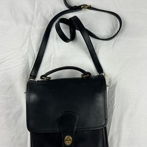 Bolso de mano vintage de cuero negro de Coach Station Bag
