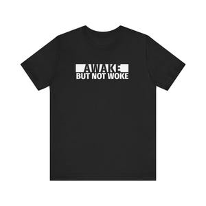 AWAKE But NOT WOKE Unisex Jersey Short Sleeve Tee