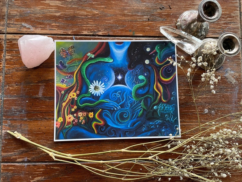 May include: A colorful, abstract painting depicting a woman's torso with two snakes wrapped around her. The woman's chest is glowing with a bright light, and there are flowers and other natural elements surrounding her. The painting is done in a vibrant style with a mix of blue, green, yellow, and red colors.
