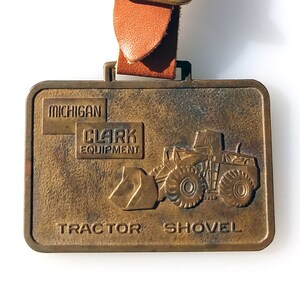 Michigan Clark Equipment Tractor Shovel Metal Arts Company Advertisement Watch Fob