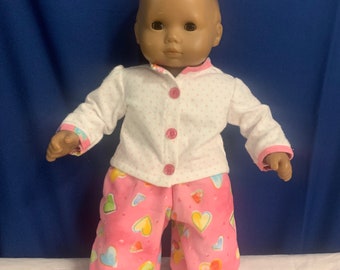 Bitty Baby PJ’s. Pink bottoms with hearts and top with pink polka-dots