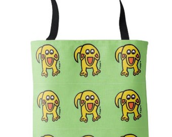 May include: A green tote bag with a repeating pattern of yellow cartoon creatures with smiling faces. The creatures have large eyes, small mouths, and four legs.