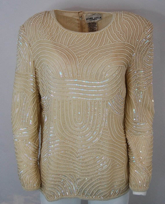white sequin blouse