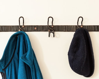 Wall mounted coat rack