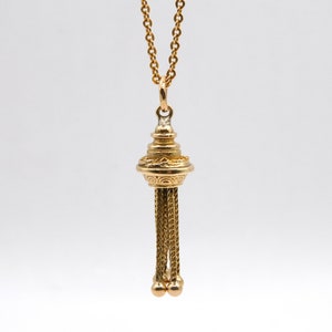 Victorien antique 9 carats. Porte-montre cinq sétaires à pampilles en or jaune. Vers 1860 - 1890