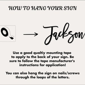 May include: A black and white illustration showing how to hang a sign using mounting tape or nails/screws. The sign says "Jackson".