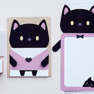 Linda tarjeta de gato negro