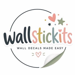 May include: A logo for wallstickits featuring the text wallstickits in multicolored rounded letters, with the tagline WALL DECALS MADE EASY below. The design includes a circular border, a small heart, a star, and a peeling corner effect.