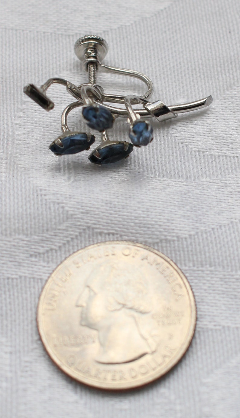 SBE # 19 Vintage Silver Tone Screw Back Earrings with Floral Like Sculpture of Blue Marquis Cut Crystal Rhinestones