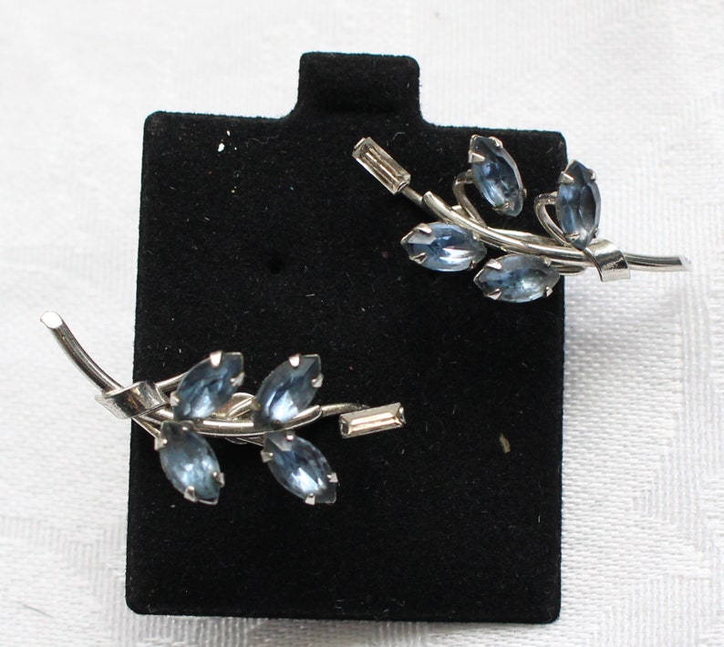 SBE # 19 Vintage Silver Tone Screw Back Earrings with Floral Like Sculpture of Blue Marquis Cut Crystal Rhinestones