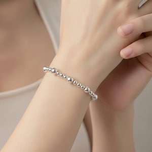 Rekbare armband van sterling zilver met kralen: een sierlijke armband met bolletjes van 3 mm x 5 mm, een leuk cadeau voor haar.