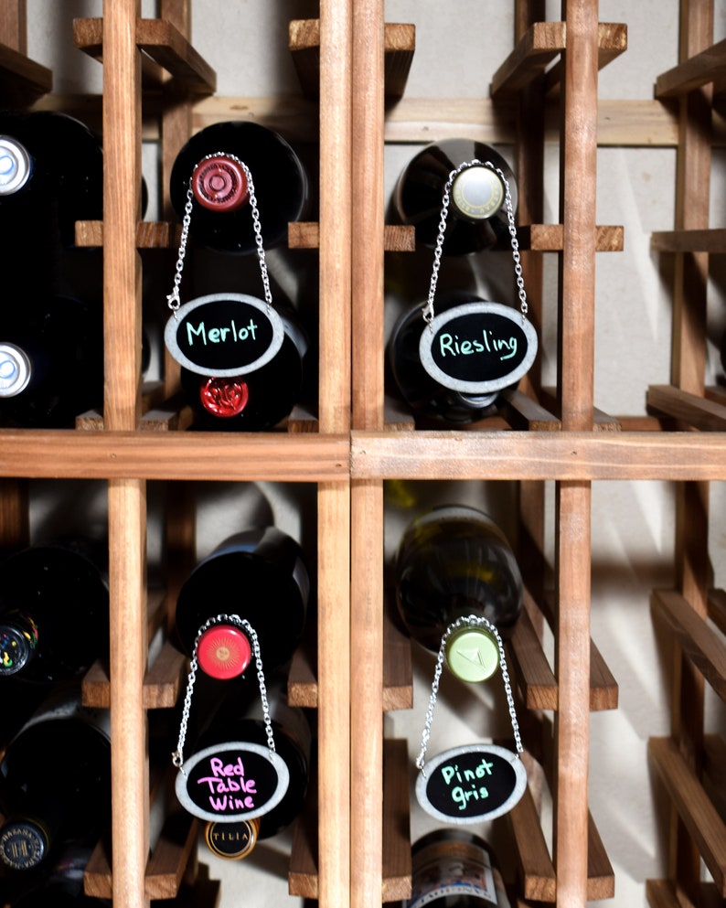 Tags labeling wine in wine cellar