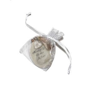 Wedding tag inside white organza gift bag.