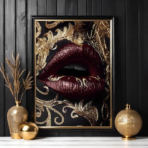 Puede incluir: Primer plano de un par de labios rojos con detalles de pan de oro. Los labios están sobre un fondo negro con un patrón de pan de oro.