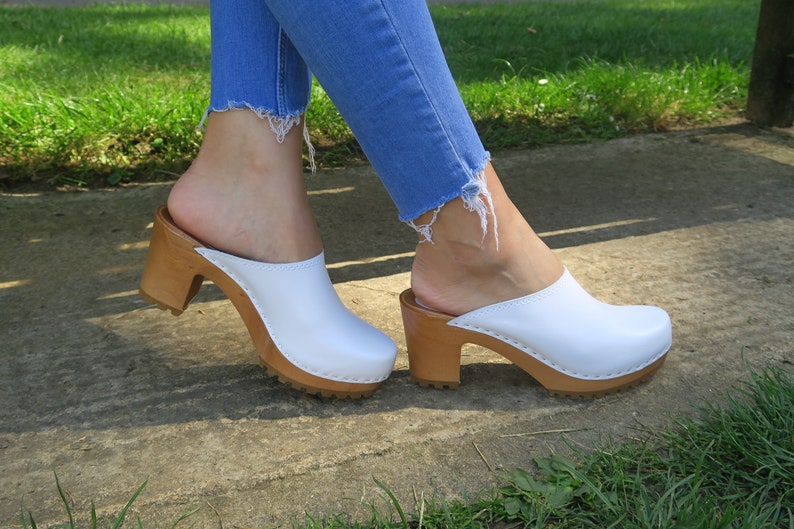 white high heel clogs