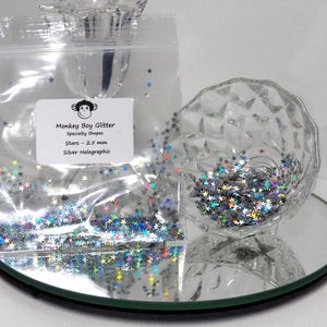 Srebrne holograficzne brokatowe kształty! Specjalne kształty gwiazdek 2,5 mm! Holograficzne srebro! Odwiedź nasz sklep! B-171