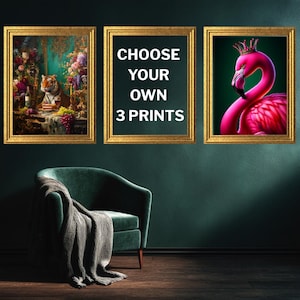 May include: Three framed art prints. One depicts a tiger at a table with wine and flowers. Another shows a pink flamingo wearing a crown. The third print has the text "CHOOSE YOUR OWN 3 PRINTS" on a dark background.