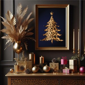 May include: A gold framed print featuring a blue background and a leopard print Christmas tree. The print is surrounded by gold candles, baubles, and gift boxes on a wooden table with a leopard print design.