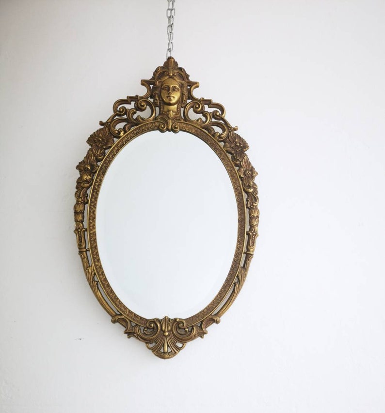 Fine Ornate Gold Metal Mirror With Icon Details It Is A Fine Ornate Gold Metal Mirror With Icon