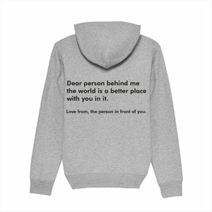 May include: Gray hooded sweatshirt with the text "Dear person behind me the world is a better place with you in it. Love from, the person in front of you."