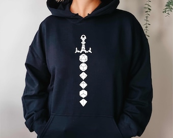 May include: A navy blue hoodie with a white graphic of a sword and dice. The design features a sword at the top, with various dice shapes descending down the center. The hoodie has a front pocket and a hood.