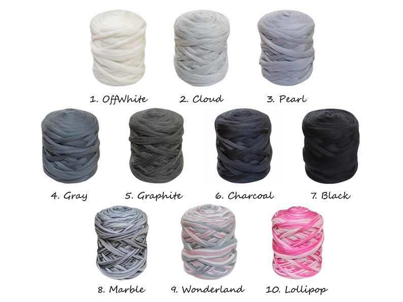 May include: Ten skeins of yarn in various colors, including off-white, gray, black, and pink. The yarn is arranged in two rows of five skeins each. The skeins are labeled with numbers and names, such as "OffWhite", "Cloud", "Pearl", "Gray", "Graphite", "Charcoal", "Black", "Marble", "Wonderland", and "Lollipop".