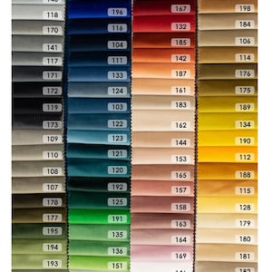 May include: A swatch card with 100 fabric samples in various colors and textures. The swatches are numbered from 100 to 199.