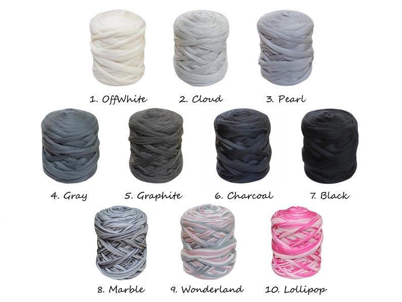 May include: Ten skeins of yarn in various colors, including off-white, gray, black, and pink. The yarn is arranged in two rows of five skeins each. The skeins are labeled with numbers and names, such as "OffWhite", "Cloud", "Pearl", "Gray", "Graphite", "Charcoal", "Black", "Marble", "Wonderland", and "Lollipop".