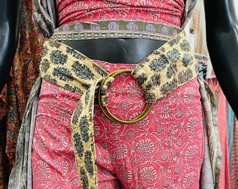 Cummerbund belt with reversible silk buckle.