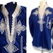 see more listings in the Tops / Blouses section