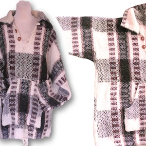 May include: A white, black and burgundy plaid hooded poncho with a drawstring and a pocket.