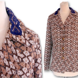 May include: A brown and white patterned blazer with a blue lace collar. The blazer has a button closure and long sleeves.