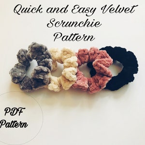 May include: Four velvet scrunchies in gray, cream, pink, and black. The scrunchies are arranged in a circle on a white background. The text "PDF Pattern" is written in a circle below the scrunchies.