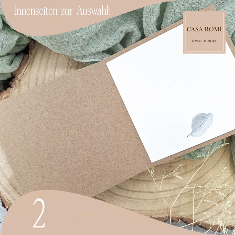 May include: A kraft paper card with a white insert. The insert has a single, light blue pressed leaf on it. The card is folded in half and the text "CASA ROMI" is printed on the front. The text "ROMANTIC MINDS" is printed below the name. The number "2" is printed on the bottom left corner of the image.