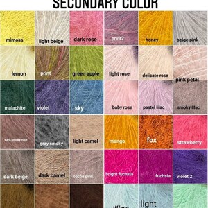 May include: A chart of 36 different yarn colours, with each colour labelled with a name. The colours are arranged in a grid pattern, with the names of the colours printed below each swatch.