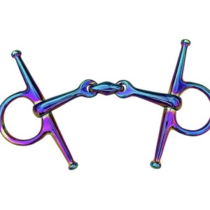 May include: A rainbow-colored horse bit with a loose ring and a center jointed mouthpiece.