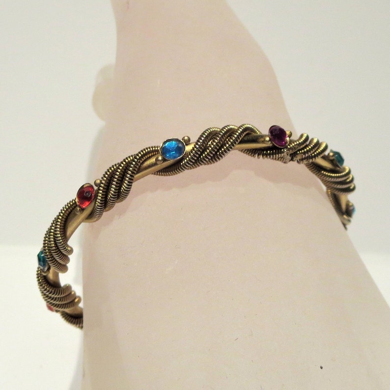 Multi Colored Rhinestone Rope Twist Gold Tone Bangle