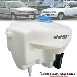 May include: White plastic windscreen washer fluid reservoir tank for a Toyota Corolla E100 or E110 series car. The tank has a blue cap and a black pump.
